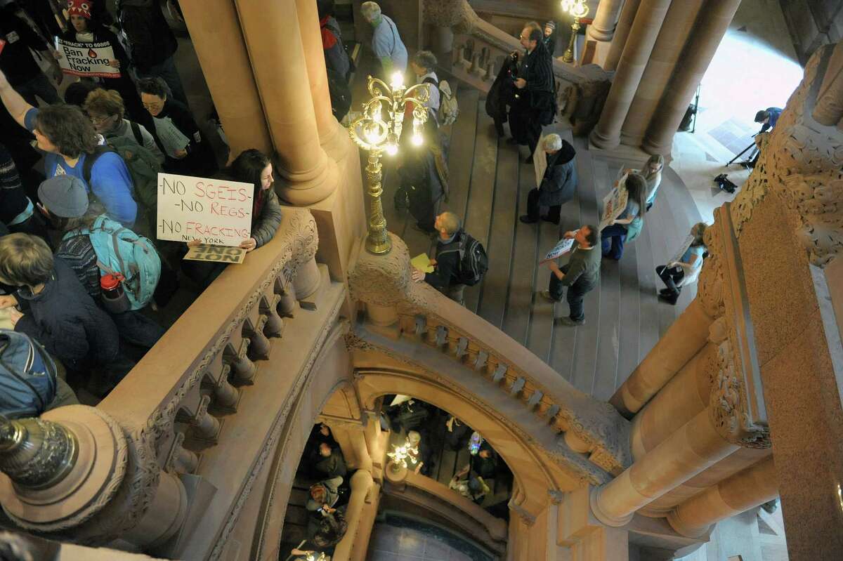 Protestors who are against the State allowing hydraulic fracturing, hold a rally on the Million Dollar Staircase inside the Capitol on Monday, Feb. 4, 2013 in Albany, NY. (Paul Buckowski / Times Union)