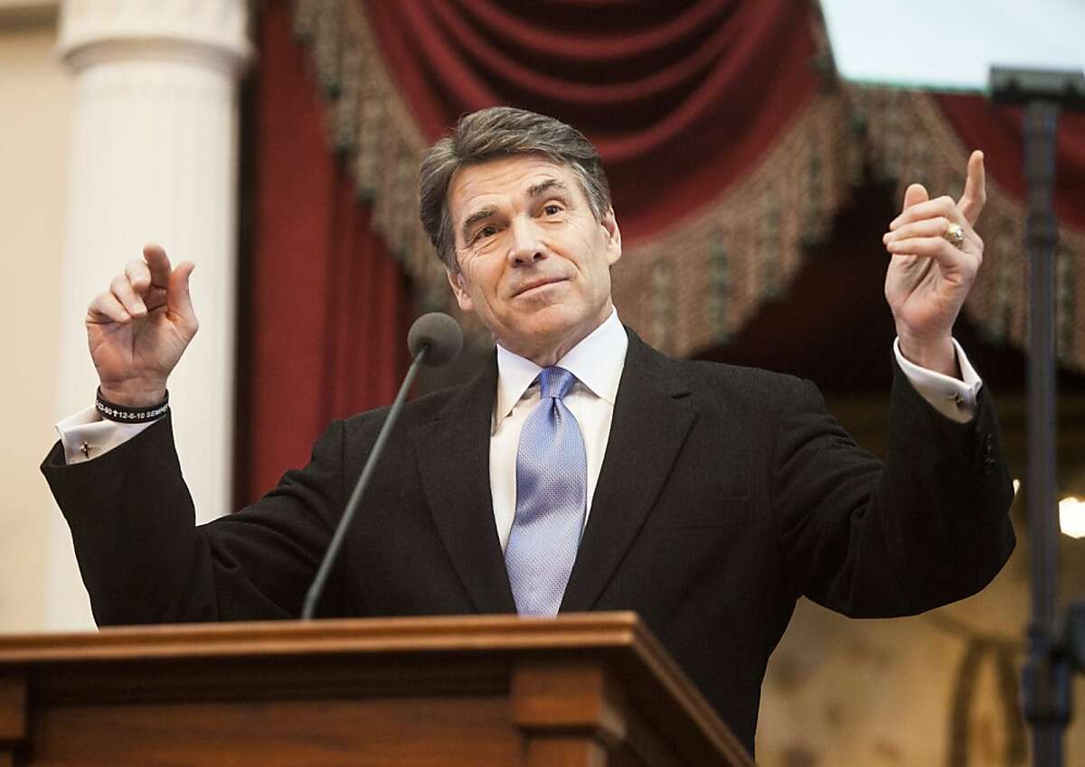 Texas Gov. Rick Perry speaks on the opening day of Texas' biennial legislation season, at the Texas State Capitol in Austin, Texas, Jan. 8, 2013. A boom in revenues from sales taxes as well as taxes from oil and natural gas production have given Texas a budget surplus that the state comptroller has estimated at $8.8 billion, causing a debate over what to do with the money. (Ben Sklar/The New York Times)