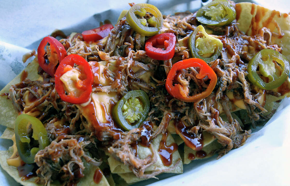 Original San Antonio Hot Dog House's nachos are a heaping helping of peppers, meat and cheese.