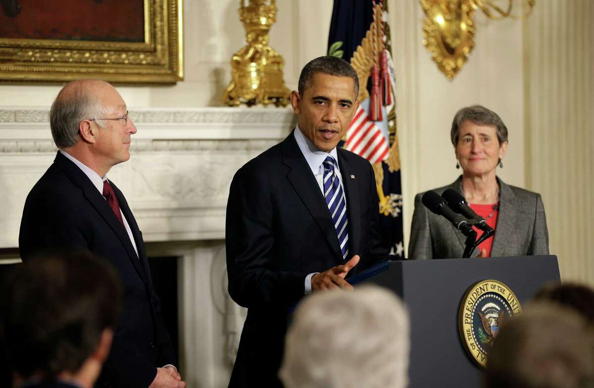President Barack Obama announces he is nominating REI CEO Sally Jewell, right, as the next interior secretary replacing outgoing Interior Secretary Ken Salazar, left, Wednesday, Feb. 6, 2013, in the State Dining Room of the White House in Washington. (AP Photo/Pablo Martinez Monsivais)