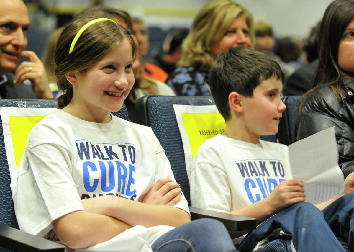 Ryan Sklover, 10, left, and Ryan Kenny, 8, look on during the R2 Spelling Bee benefiting the Juvenile Diabetes Research Foundation and Northeast Elementary School PTO at the school in Stamford on Wednesday, Feb. 6, 2013. The spellling bee was inspired by Sklover and Kenny who have juvenile diabetes.
