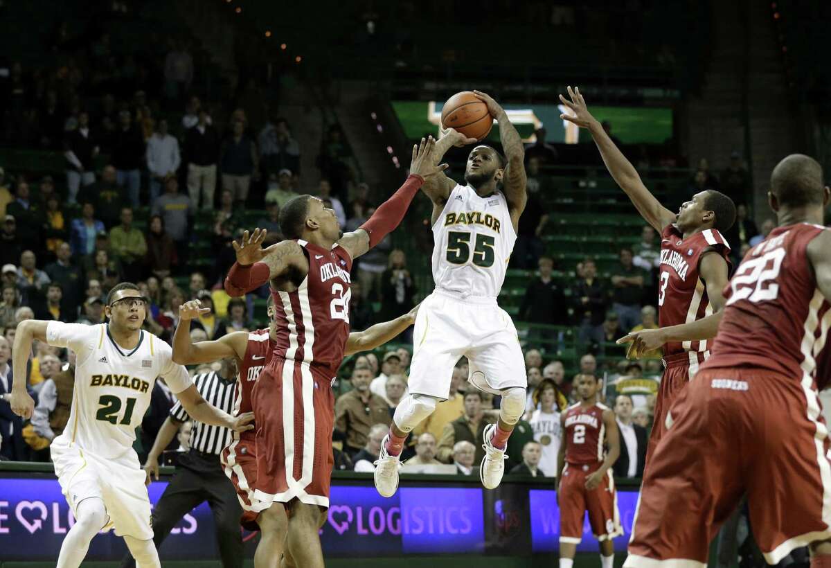 Baylor guard Pierre Jackson (right) stands out among his Big 12 peers despite his 5-foot-10 stature. He has a shot to become the first player to lead the conference in scoring and assists in the same season.