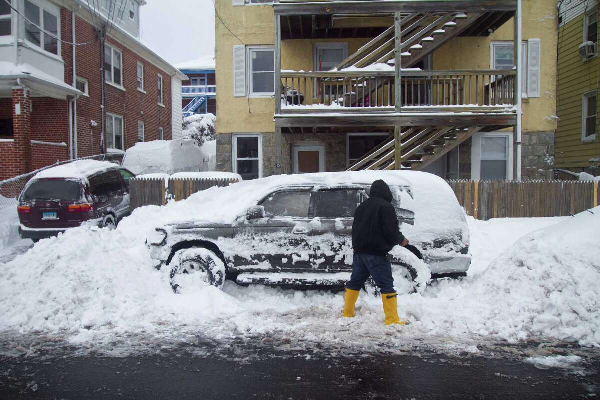 Residents of Stamford's West Side dig out from the blizzard on Saturday, Feb. 9, 2013.