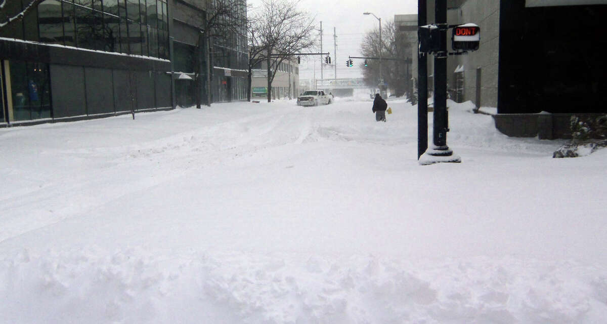 Looking east along Fairfield Avenue from Main Street in downtown Bridgeport Saturday morning. The four-wheel-drive pickup truck in the background was stuck in a drift.