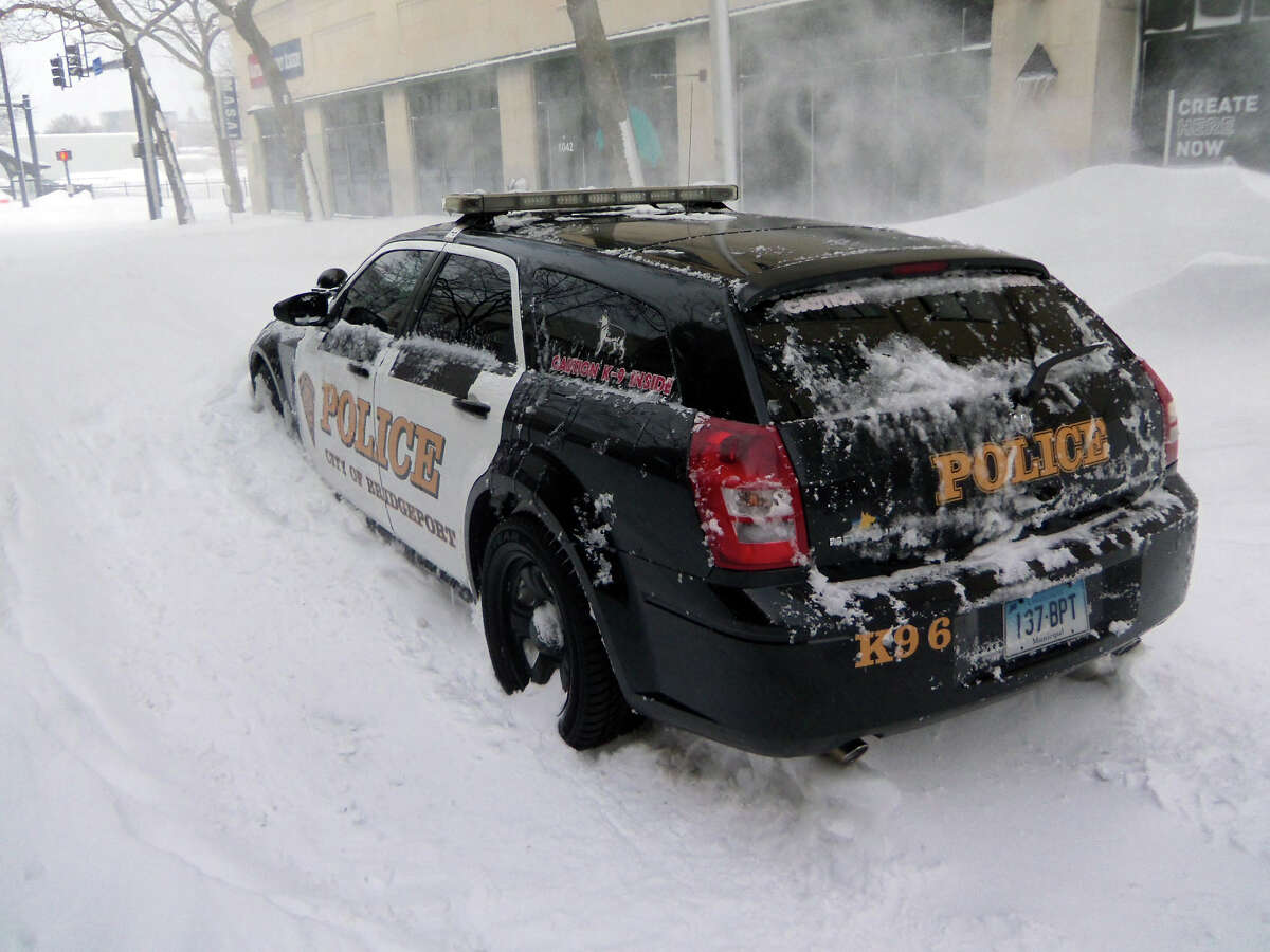 Things got so bad in downtown Bridgeport, even a police car was stranded on John Street.
