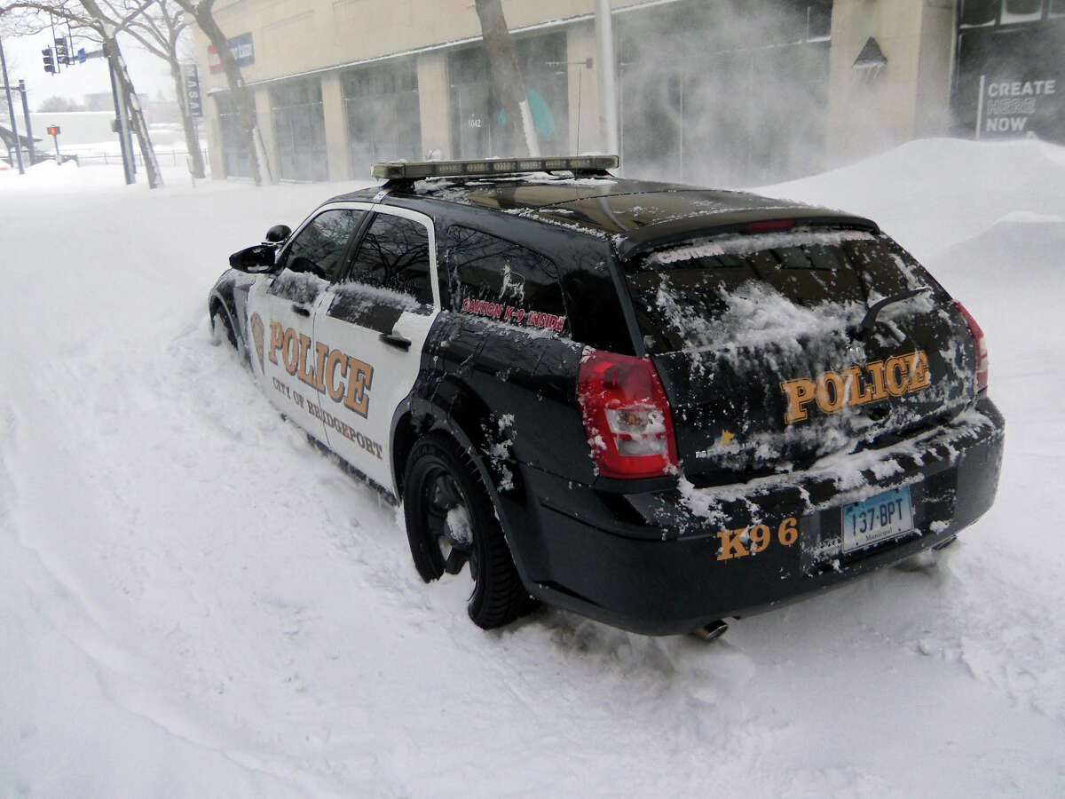 Things got so bad in downtown Bridgeport, even a police car was stranded on John Street.