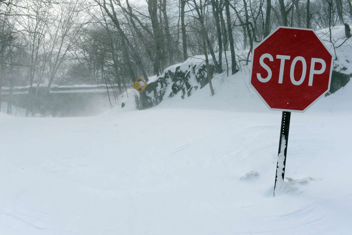 Drifting snow blocks the intersection of Cutsping and Pumpkin Ground Roads, in Stratford, Conn., Feb. 9th, 2013.