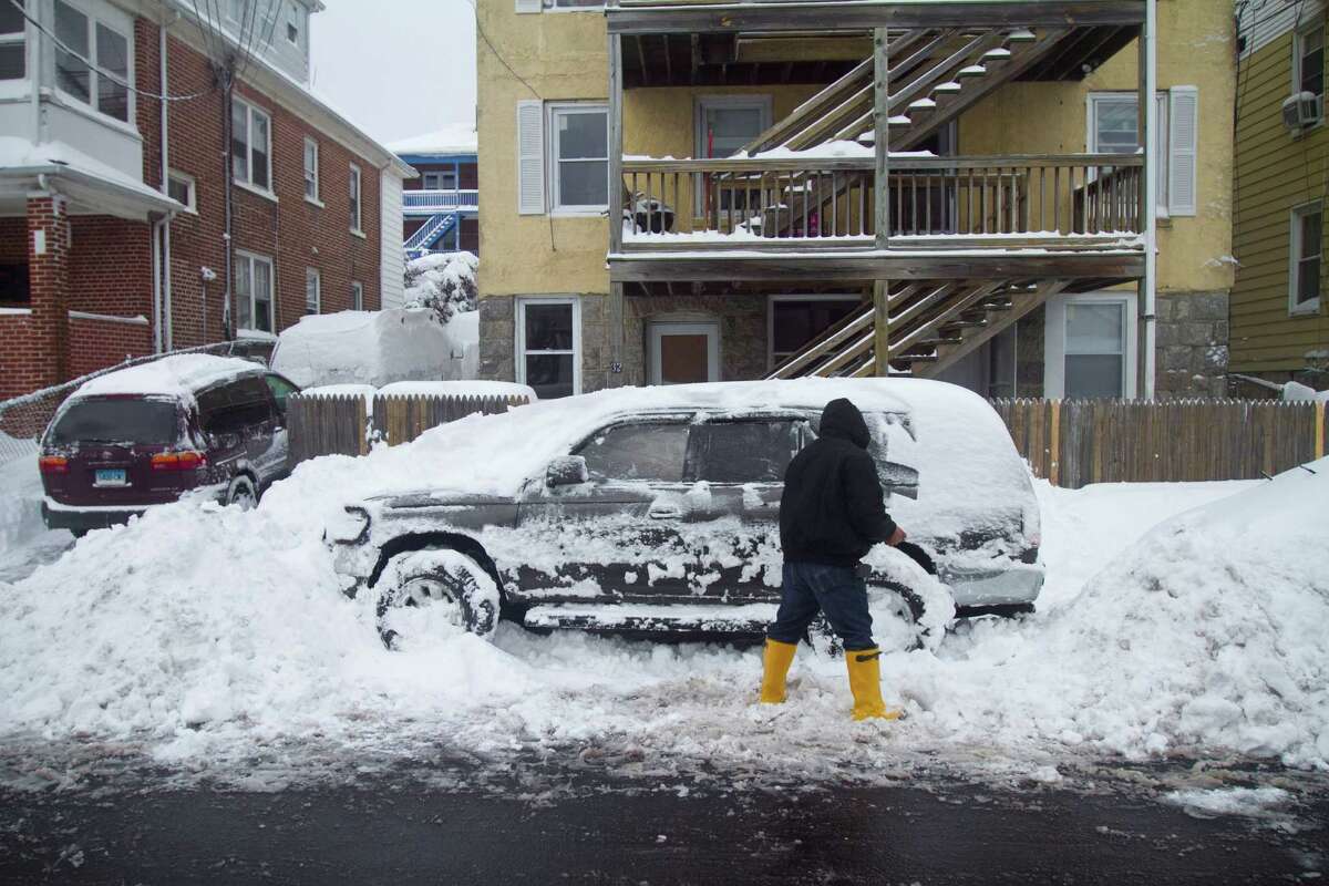 Residents of Stamford's West Side dig out from the blizzard on Saturday, Feb. 9, 2013.