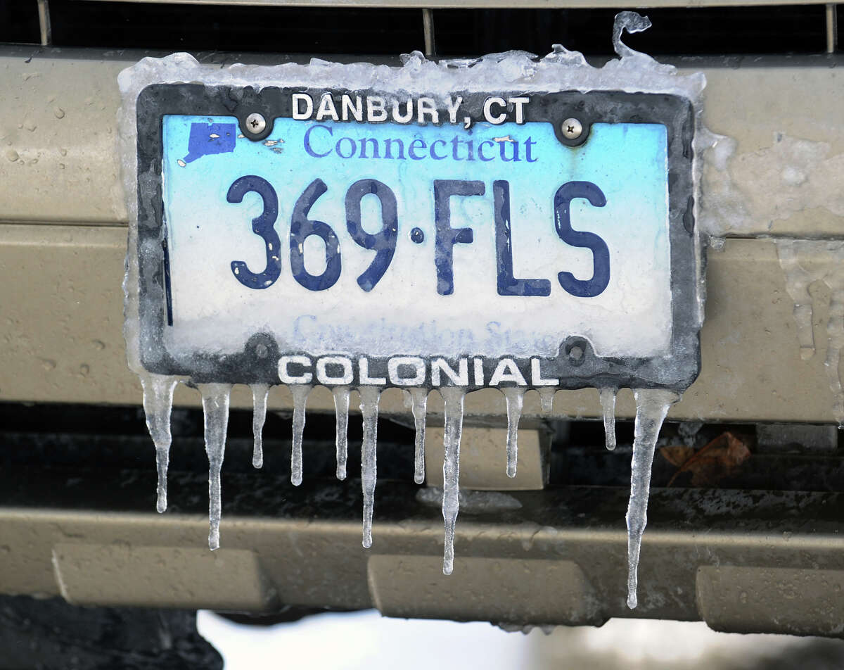A Connecticut license plate covered in ice during the aftermath of the blizzard that hit Greenwich, Conn., Saturday morning, Feb. 9, 2013
