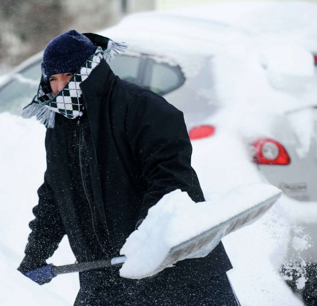 Gabe Quino digs out on Jeniford Rd. after a overnight blizzard dumped over teo feet of snow in Fairfield, Conn. on Saturday, Feb. 9, 2013. Southwestern Connecticut was hit hard by one of the biggest snowstorms in history.