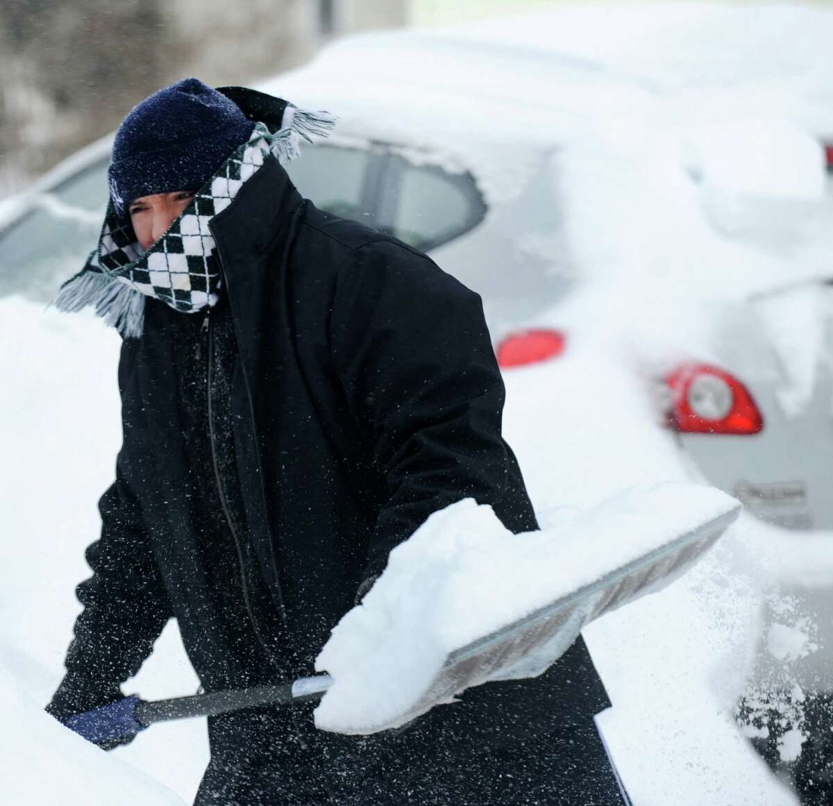 Gabe Quino digs out on Jeniford Rd. after a overnight blizzard dumped over teo feet of snow in Fairfield, Conn. on Saturday, Feb. 9, 2013. Southwestern Connecticut was hit hard by one of the biggest snowstorms in history.