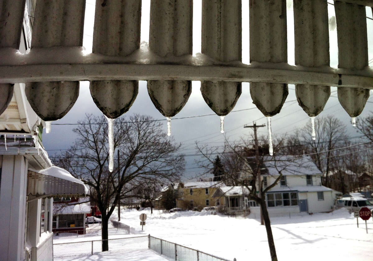 Icicles on an awning after a blizzard pounded the region in West Haven, Conn. on Saturday February 9, 2013.