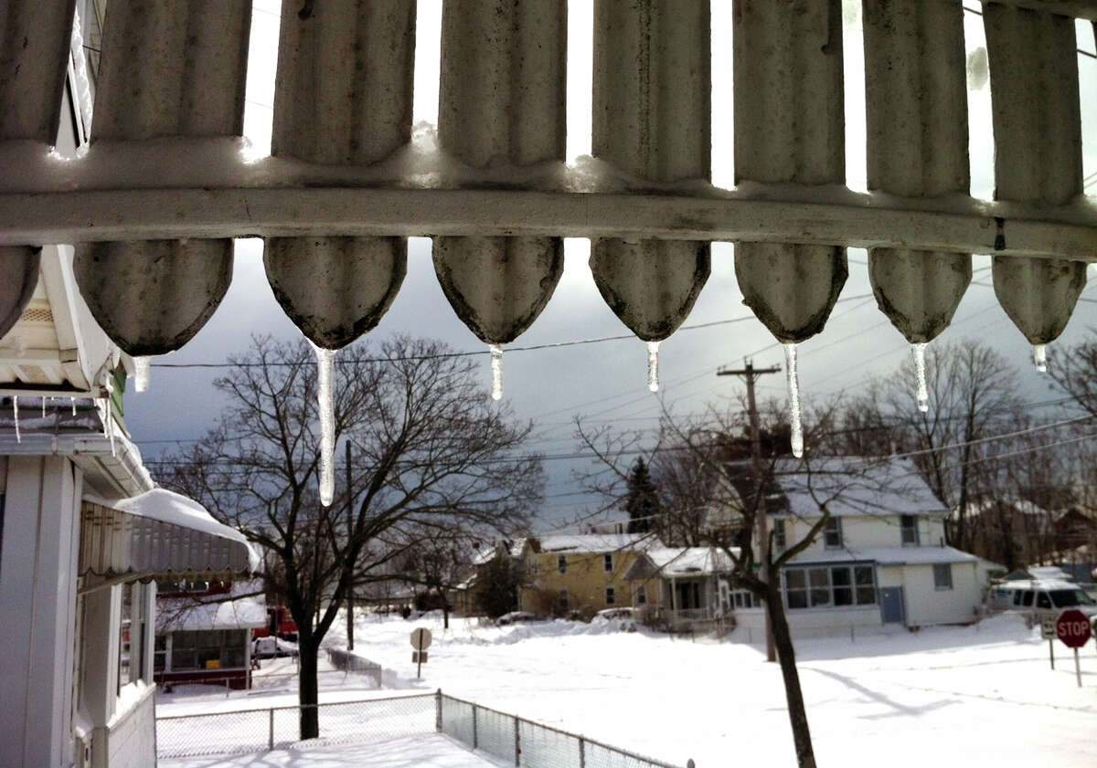 Icicles on an awning after a blizzard pounded the region in West Haven, Conn. on Saturday February 9, 2013.