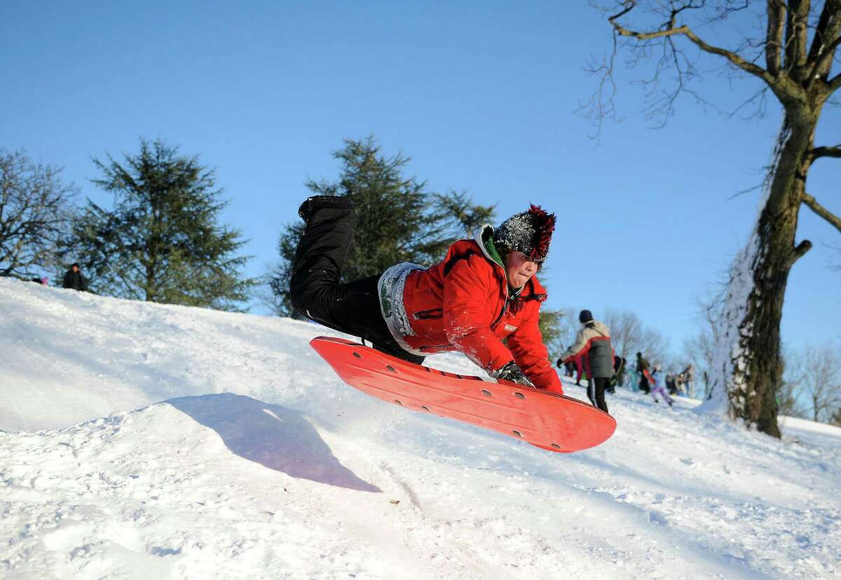 Baylor Bridges catches air on a hill in Cummings Park in Stamford, Conn., on Saturday, February 9, 2013.
