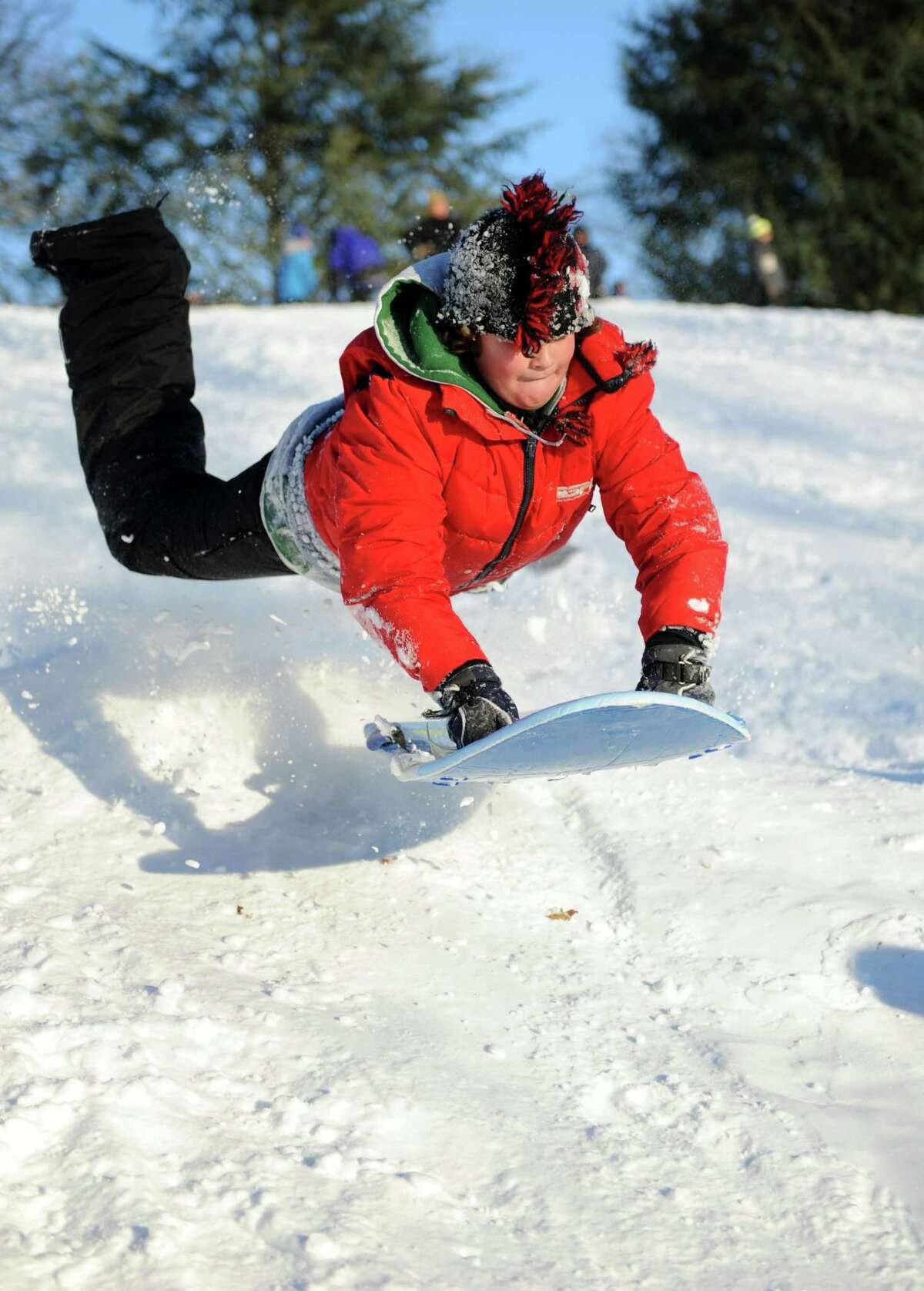 Baylor Bridges catches air on a hill in Cummings Park in Stamford, Conn., on Saturday, February 9, 2013.