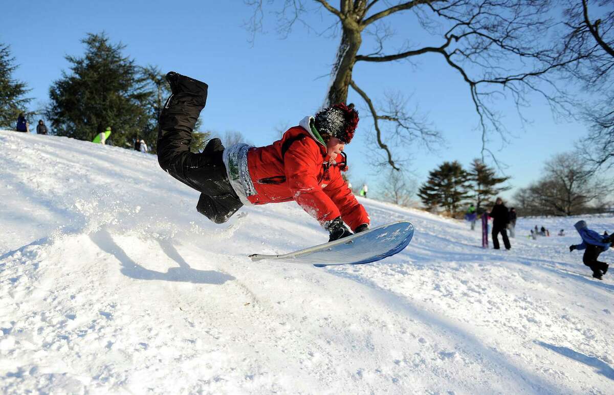 Baylor Bridges catches air on a hill in Cummings Park in Stamford, Conn., on Saturday, February 9, 2013.