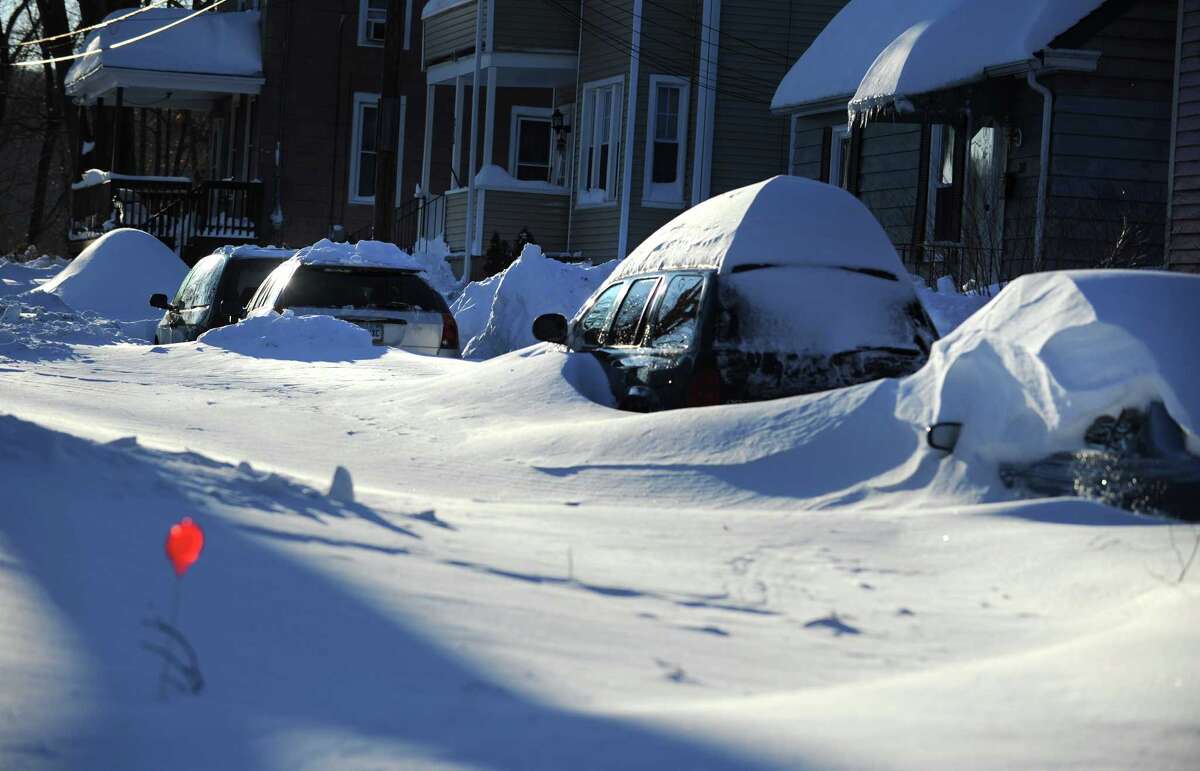 Most side roads in Derby, Conn. remain covered in snow Saturday, Feb. 9, 2013 following a blizzard that dumped up to three feet of snow across the state.