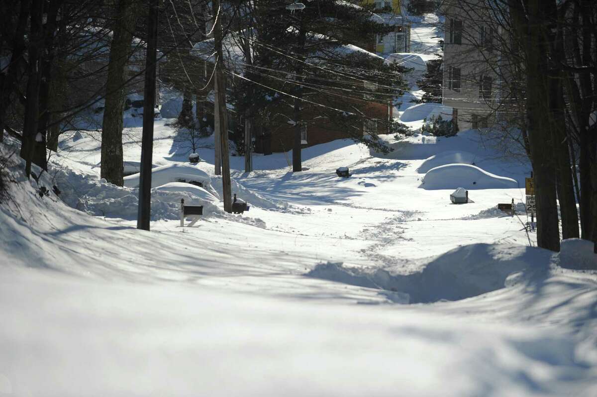 Most side roads in Derby, Conn. remain covered in snow Saturday, Feb. 9, 2013 following a blizzard that dumped up to three feet of snow across the state.