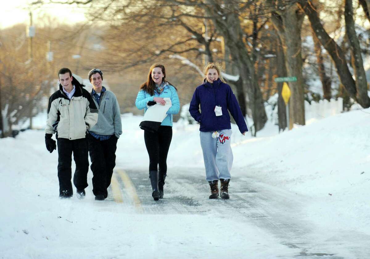 Many roads like Judd St. in Fairfield, Conn. had more pedestrians than vehicles on Friday, Feb. 9, 2013. A blizzard that dumped over two feet of snow across the area was one of the biggest snowstorms in history.