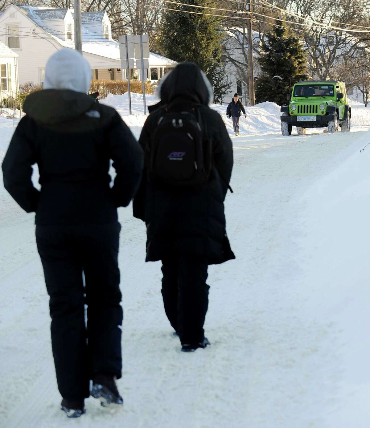 Many roads like Stillson Rd. in Fairfield, Conn. had more pedestrians than vehicles on Friday, Feb. 9, 2013. A blizzard that dumped over two feet of snow across the area was one of the biggest snowstorms in history.