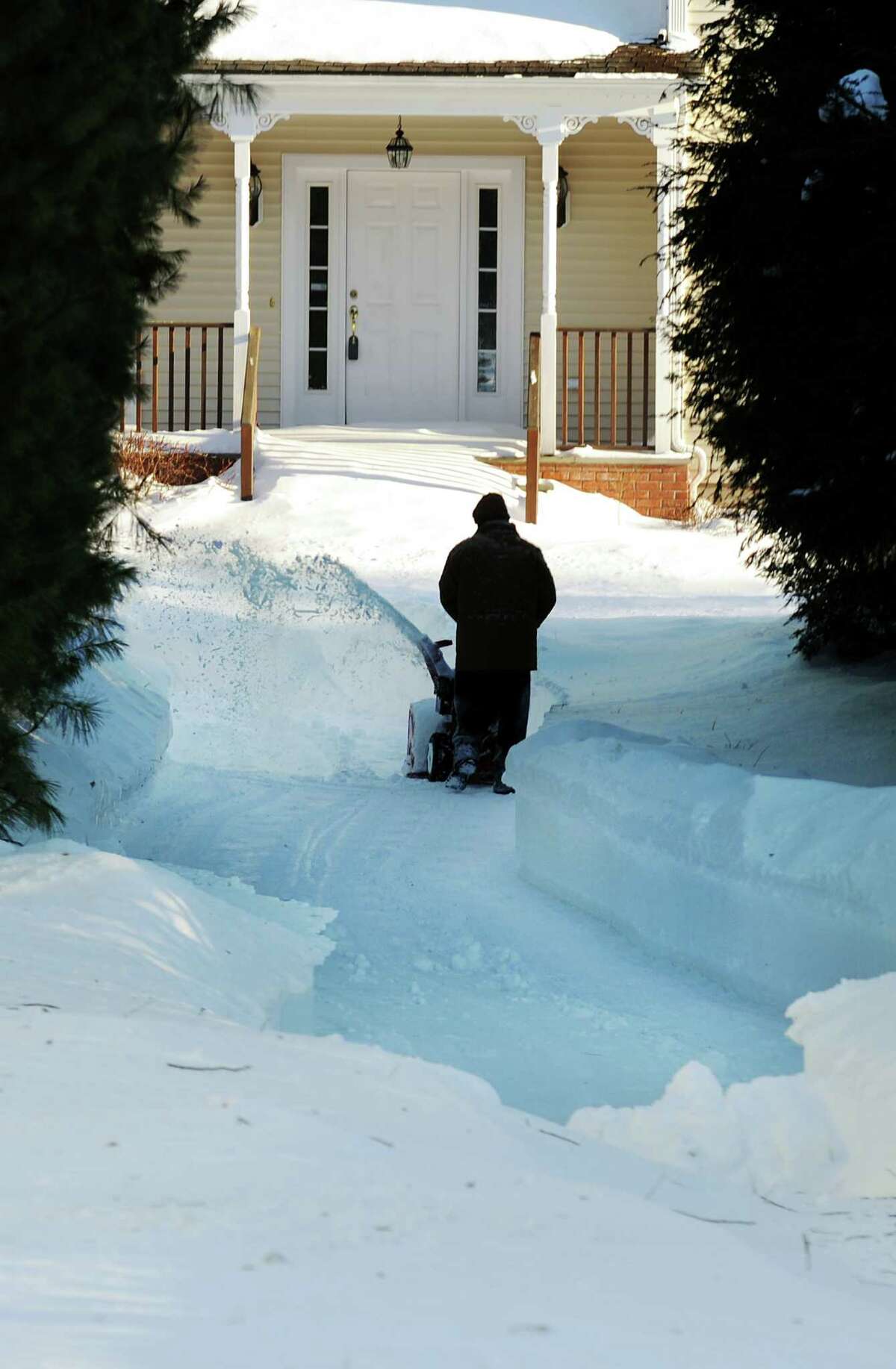 Residents continue to dig their way out on Brookside Dr. in Fairfield, Conn. on Friday, Feb. 9, 2013. Southwestern Connecticut was hit by one of the biggest snowstorms in history, a howling blizzard that dumped over two feet of snow across the area.