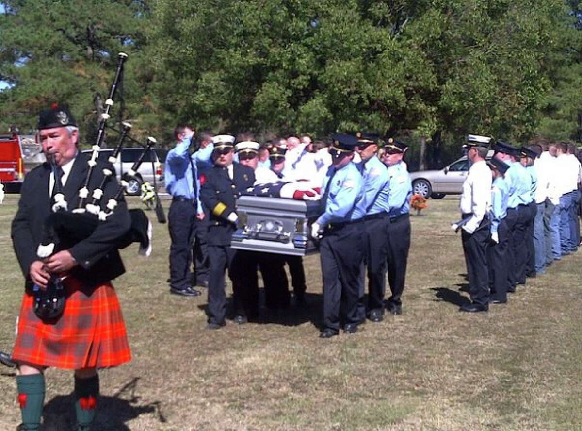 Mourners in Mississippi bury 28-year-old Joshua Smith, a father and volunteer firefighter who came to Texas to work in the oil industry. He was killed in an October 2010 accident while working for Nabors Drilling.