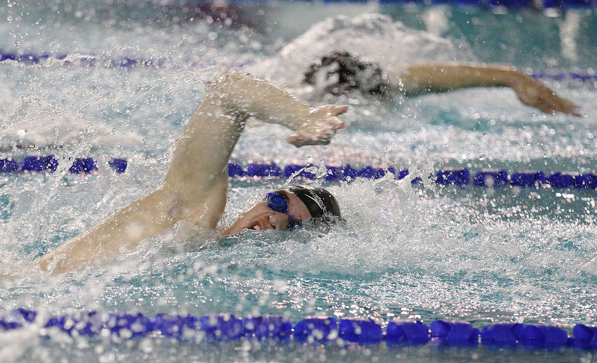 Reagan's Andrew Skowronek swims to a first place finish in the 200 yard freestyle at the Region VII-5A Championship swim meet at Josh Davis Natatorium on Saturday, Feb. 9, 2013. Skowronek finished with a time of 1:40.25.