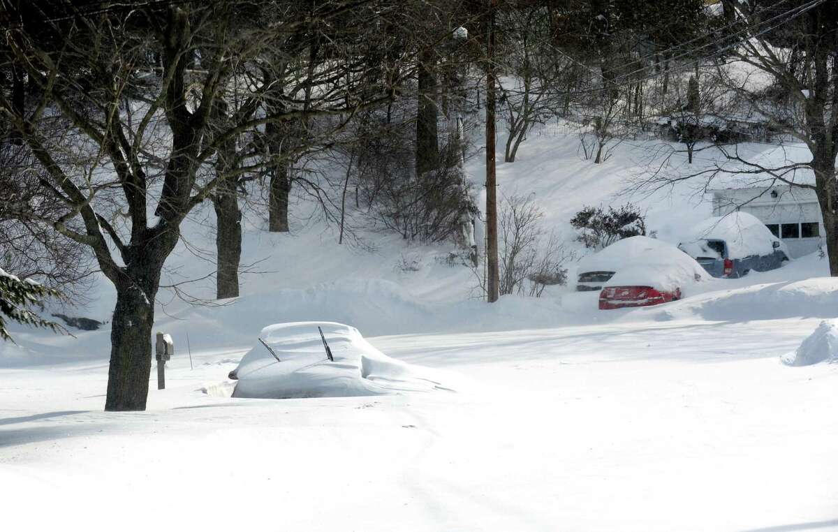 What's the point in digging out if your street is not plowed like this one, Shalimar Lane in Fairfield, Conn. on Saturday, Feb. 9, 2013. An overnight blizzard dumped over two feet of snow in the area.