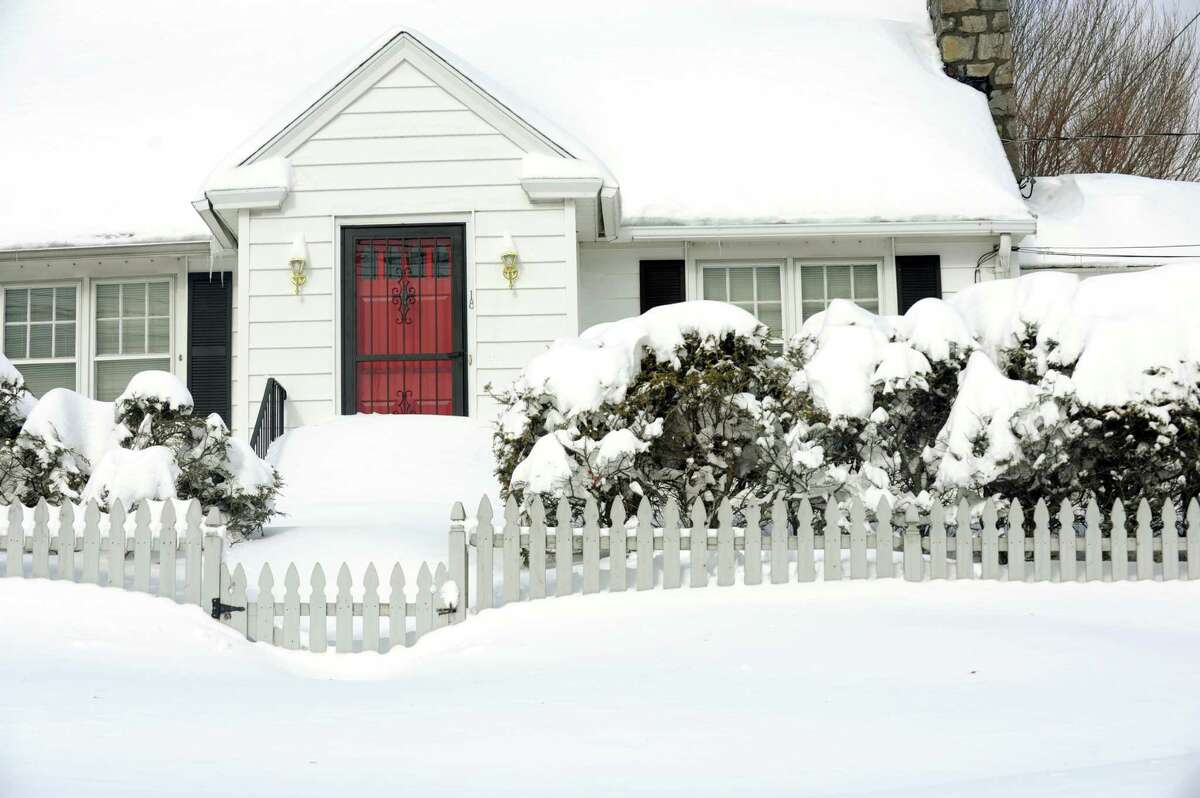 Southwestern Connecticut was hit by one of the biggest snowstorms in history leaving homes like this one on Meadowcroft Rd. in Fairfield Conn. buried in snow on Saturday Feb. 9, 2013.