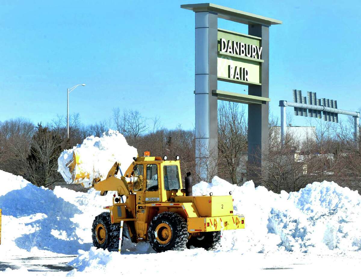 Snow removal creates huge mounds of the white stuff at the Danbury Fair mall in Danbury, Sunday, Feb. 10, 2013.