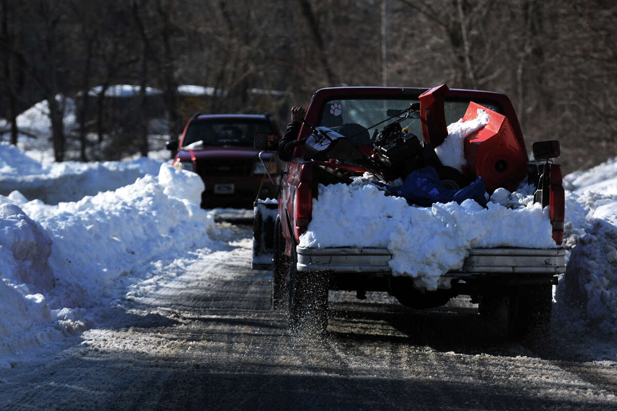 Only one lane of traffic has been plowed in the snow on Hawley Lane, in Stratford, Conn., Feb. 10th, 2013.