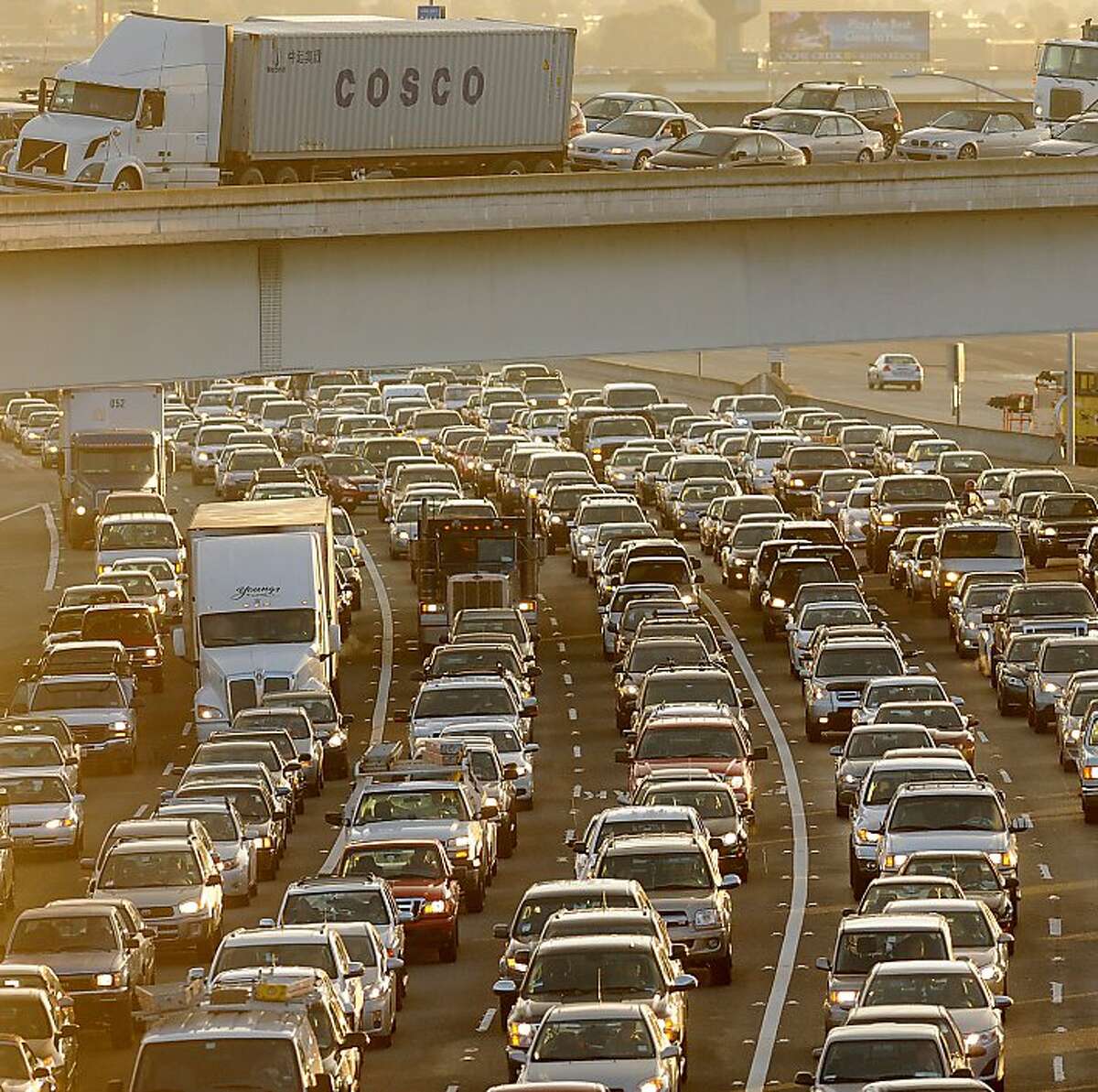 Traffic crawls towards the Bay Bridge toll plaza on Friday, Feb. 8, 2013, in Oakland, Calif. According to the Urban Mobility Report, the Bay Area ties Los Angeles for having the second-worst congestion in the country.
