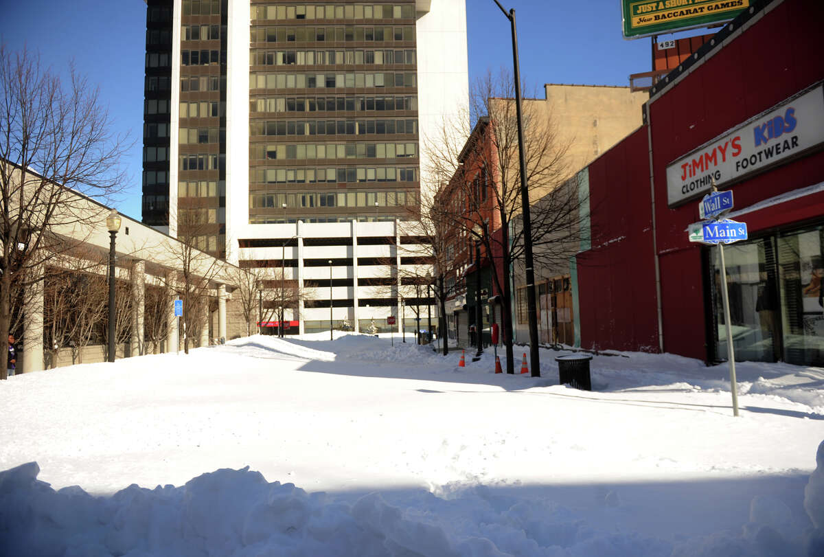 Wall Street remains unplowed in downtown Bridgeport, Conn. on Sunday, February 10, 2013.