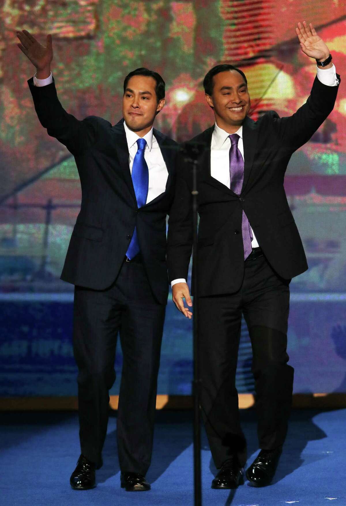 CHARLOTTE, NC - SEPTEMBER 04: State Rep. Joaquin Castro (D-TX)(R) waves with his brother San Antonio Mayor Julian Castro during day one of the Democratic National Convention at Time Warner Cable Arena on September 4, 2012 in Charlotte, North Carolina. The DNC that will run through September 7, will nominate U.S. President Barack Obama as the Democratic presidential candidate.