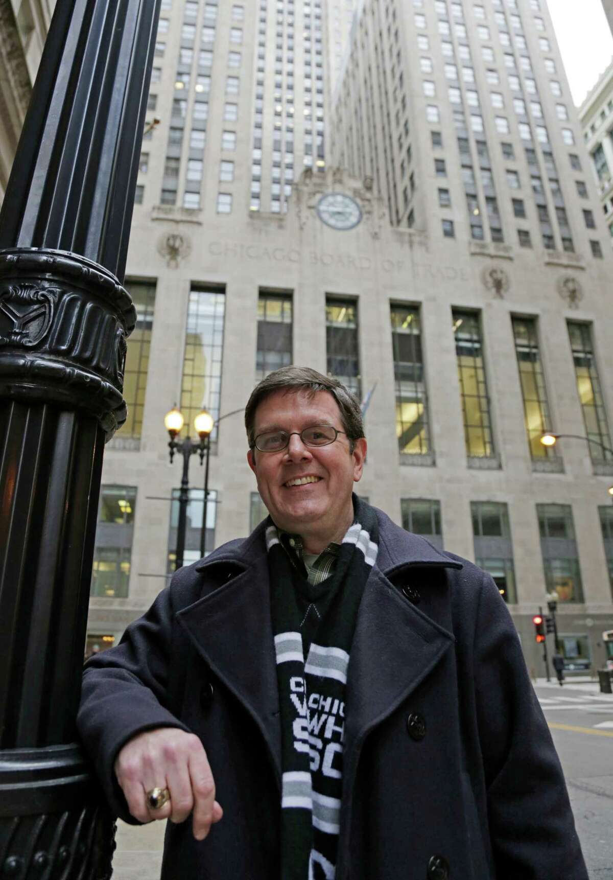 Sean Toohey, a grains broker at the Chicago Board of Trade, who had hip replacement surgery last summer, poses for a photo Monday, Feb. 11, 2013, in Chicago. Routine hip replacement surgery on a healthy patient may cost as little as $11,000 _ or up to nearly $126,000. Toohey said he has good health insurance that covered most of the costs, and it didn't occur to him to ask about price beforehand. (AP Photo/M. Spencer Green)