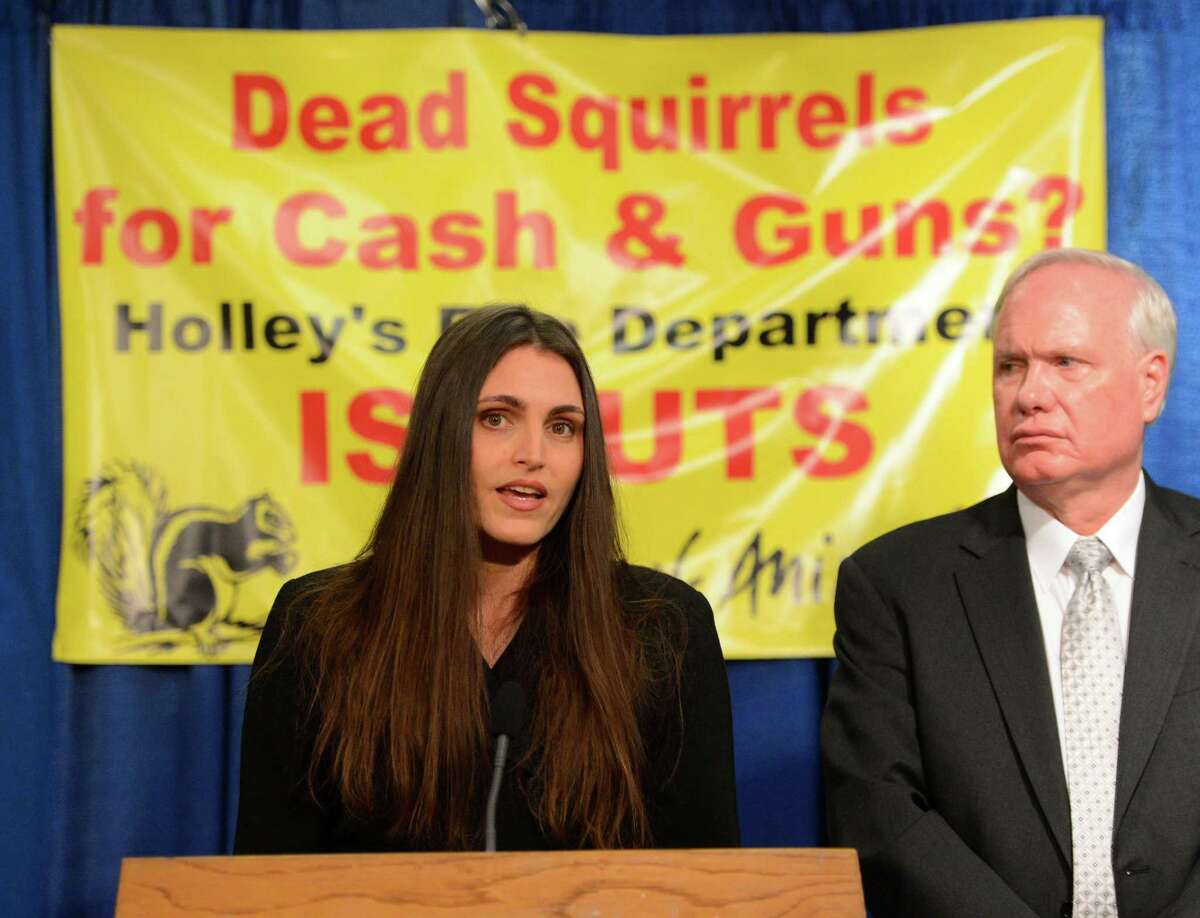Protesters slam squirrel hunters Protesters slam squirrel hunters