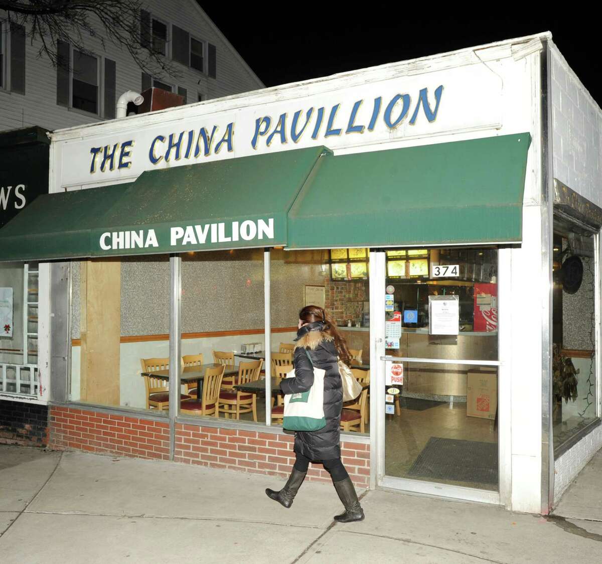 A woman walks past the China Pavilion restaurant at 374 Greenwich Ave., Thursday, Feb. 7. 2013. The restaurant has been closed by the Greenwich Health Department.