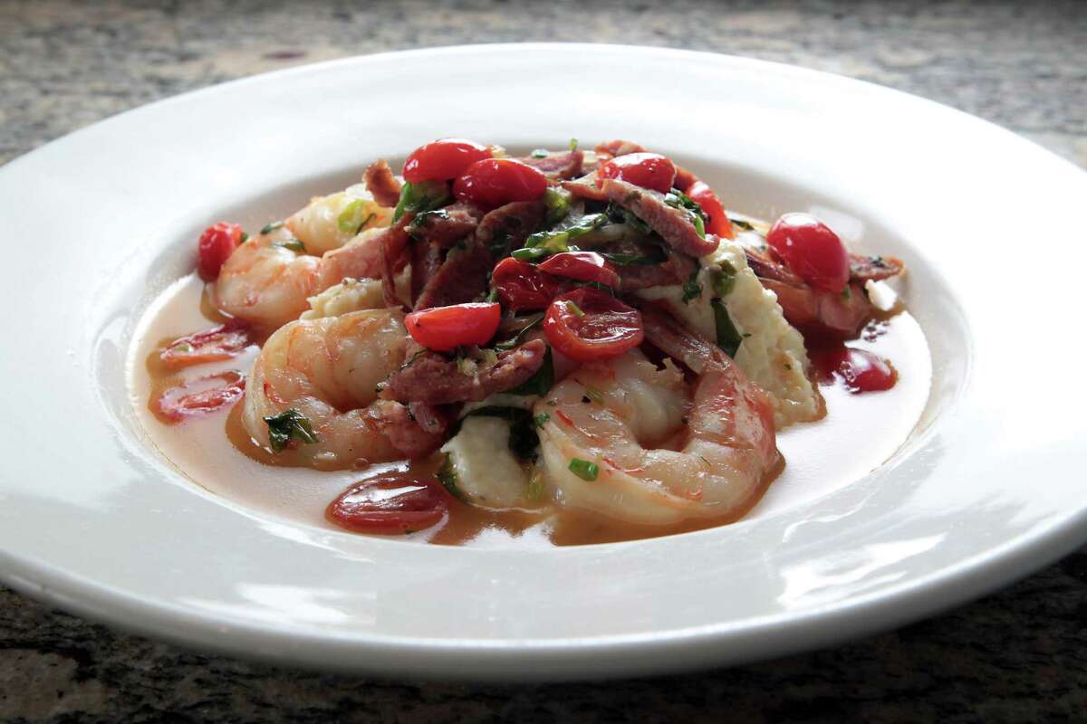 Shrimp & Grits include andouille, sherry-tomato broth and grits.