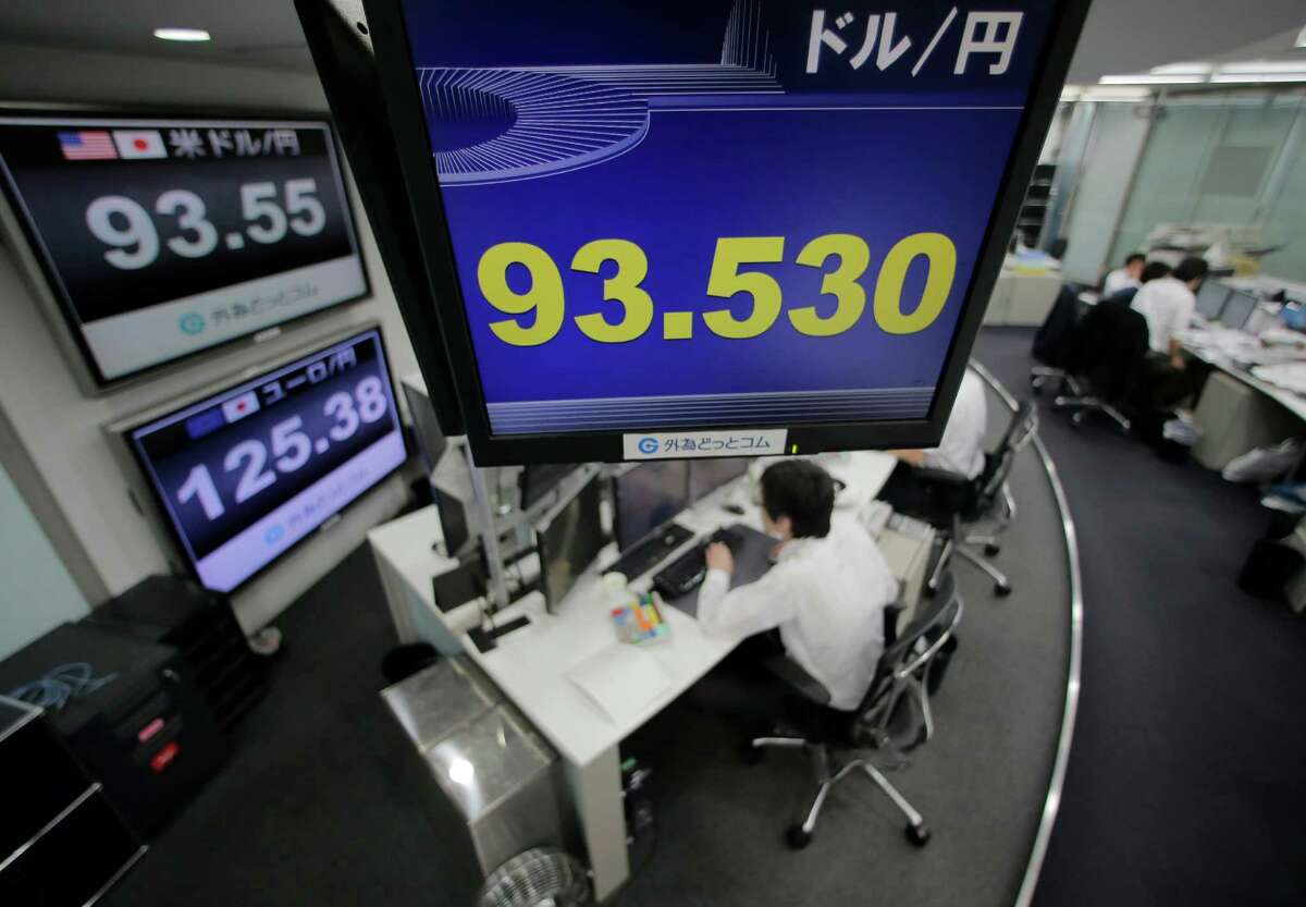 Currency traders work on the foreign exchange market in Tokyo this month. Much of the recent volatility in foreign exchange markets has been a byproduct of developments affecting the Japanese yen.