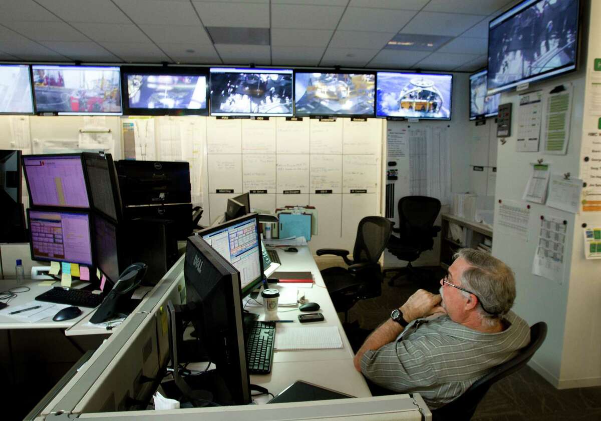 Workers in a monitoring center keep track of what happens deep inside BP's wells.