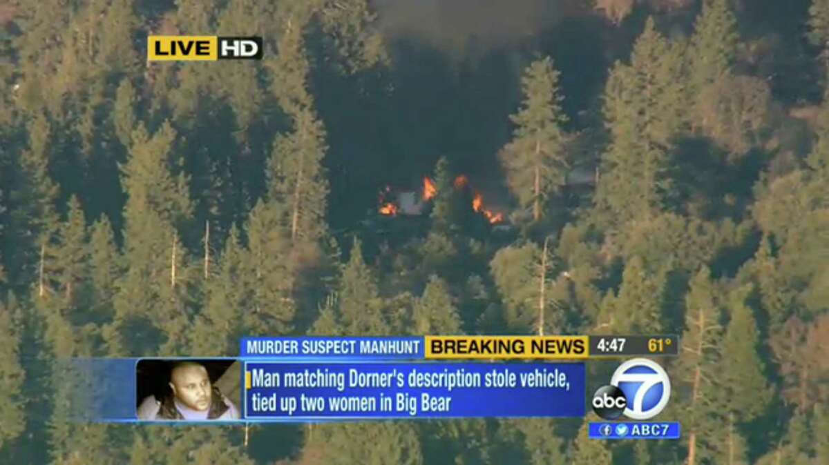 The cabin in Big Bear, Calif., where former Los Angeles police officer Christopher Dorner is believed to have barricaded himself is shown erupting in flames Tuesday in this video grab taken from a news helicopter.