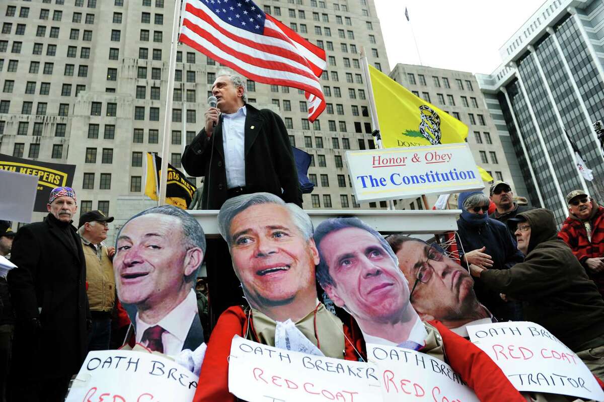 Carl Paladino, center, joins Second Amendment advocates as they rally against the SAFE Act on Tuesday, Feb. 12, 2013, at the Capitol in Albany', N.Y. (Cindy Schultz / Times Union)