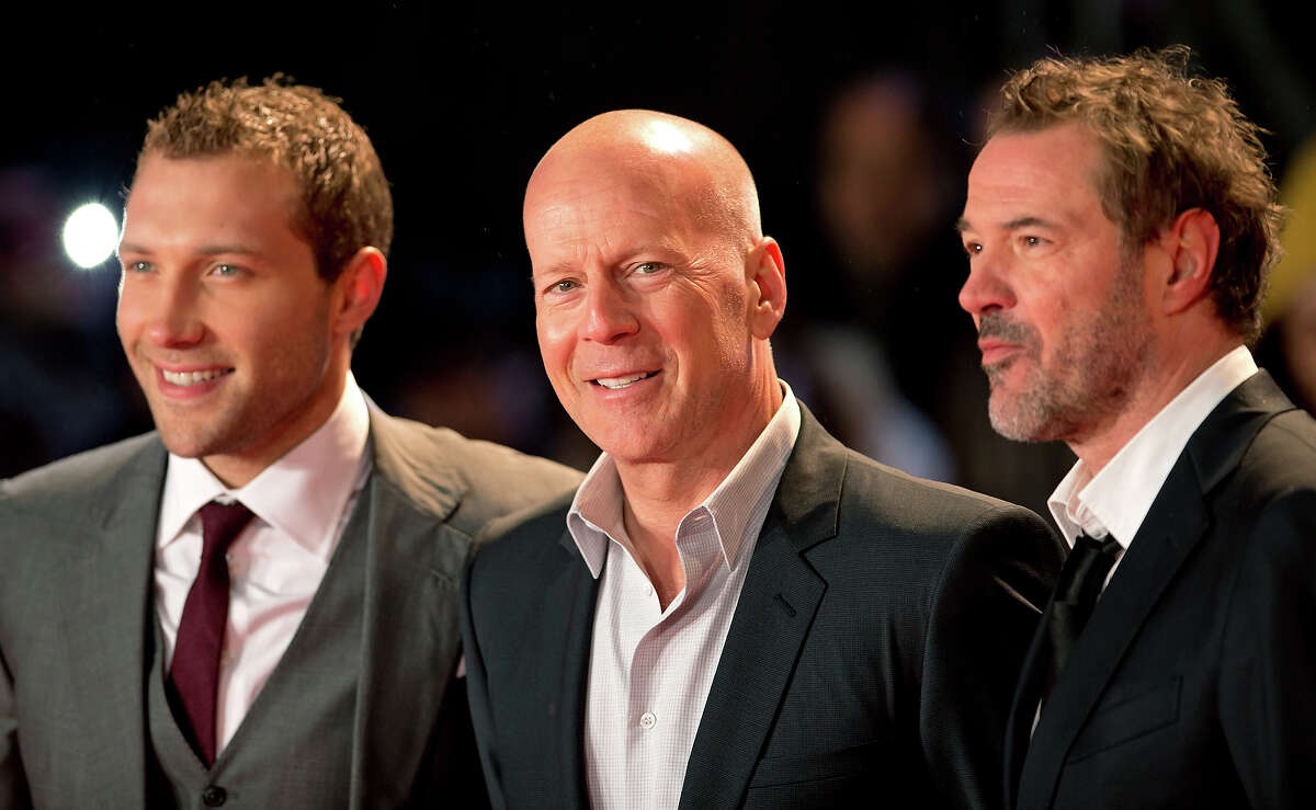 LONDON, UNITED KINGDOM - FEBRUARY 07: (EMBARGOED FOR PUBLICATION IN UK NEWSPAPERS UNTIL 48 HOURS AFTER CREATE DATE AND TIME) Jai Courtney, Bruce Willis and Sebastian Koch attend the UK Premiere of 'A Good Day To Die Hard' at Empire Leicester Square on February 7, 2013 in London, England.
