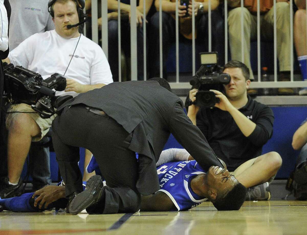 Kentucky's Nerlens Noel grimaces in pain after suffering a torn ACL on Tuesday against Florida. He's out for the season.