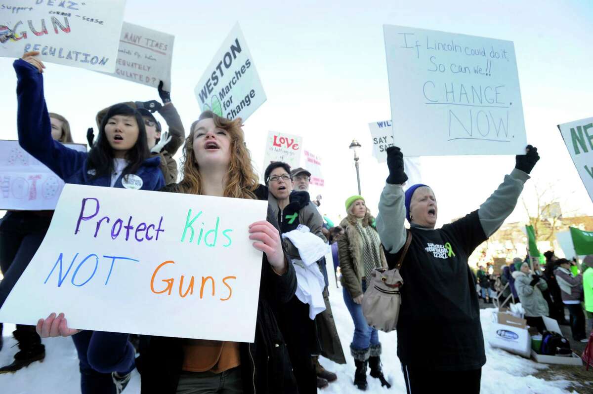 A "March for Change" rally is held on the steps of the Capital in Hartford, Conn., Thursday, Feb. 14, 2013, to promote common sense and practical changes to the state's gun laws.