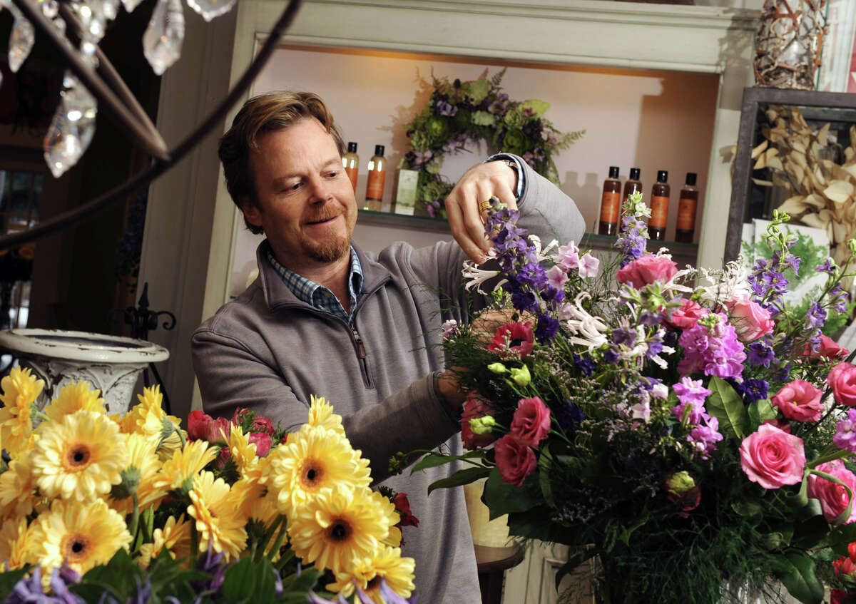 David Michael Schmidt works at his store Renaissance Floral Design on Tuesday Feb. 12, 2013 in Guilderland, N.Y. Schmidt is designing the display that will be in the main window at New York in Bloom at the NYS Museum. (Lori Van Buren / Times Union)