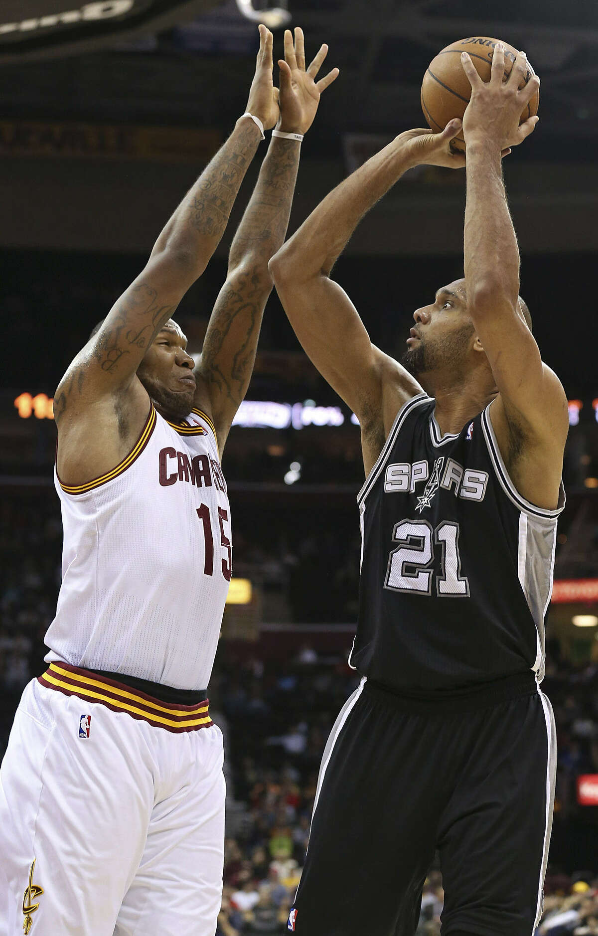 The Spurs' Tim Duncan (right) had 13 points, six boards and flour blocks in his return Wednesday.