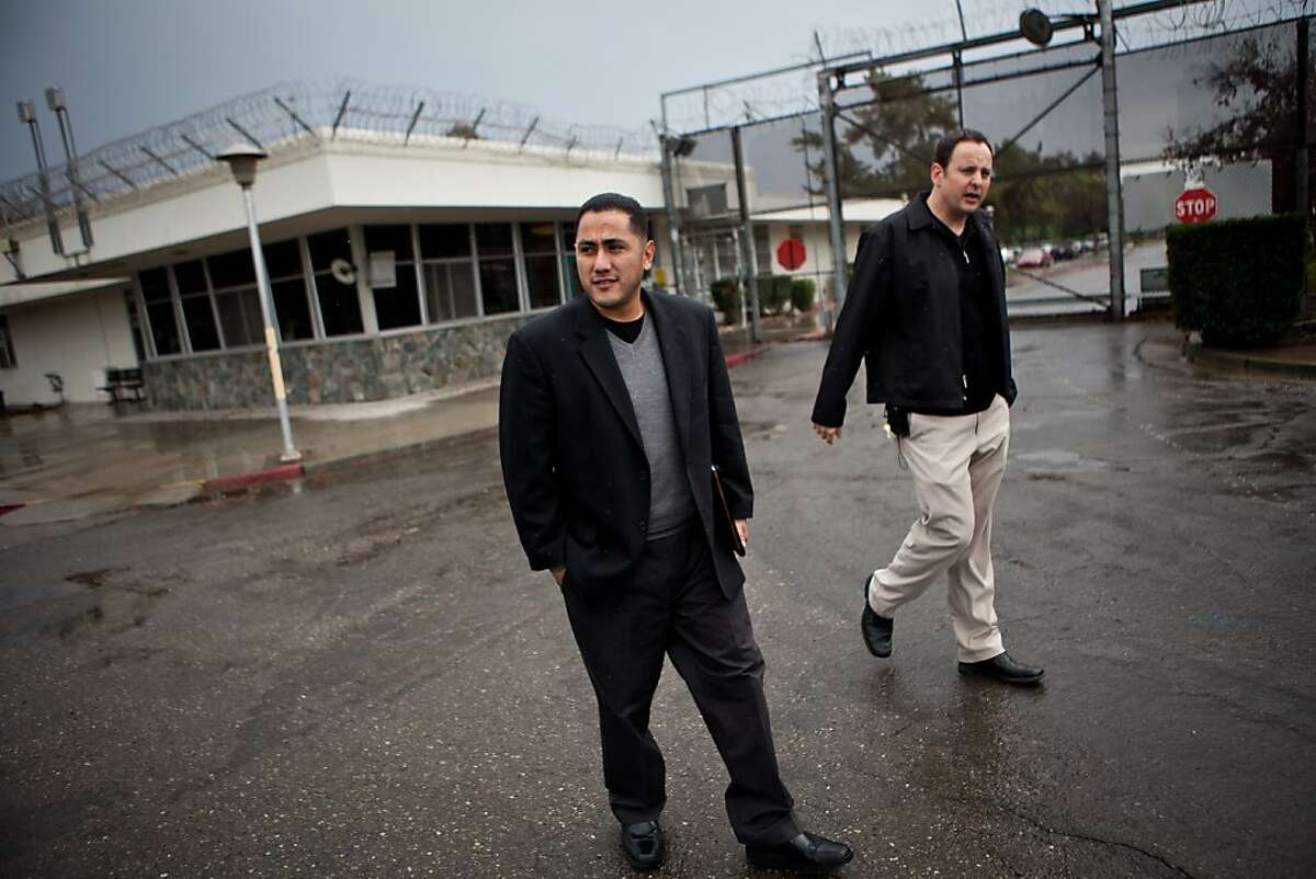 Soros Justice Fellow Frankie Guzman, center, arrives at the O.H. Close Youth Correctional Facility escorted by the California Youth Authority's Craig Watson in Stockton, Calif., December 21, 2012.