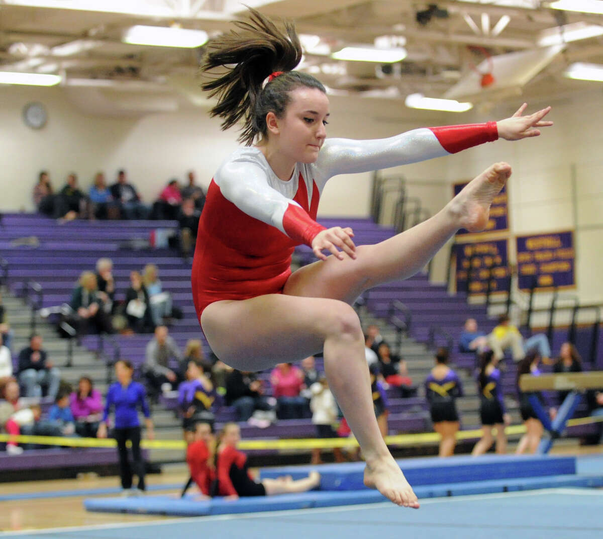 Emily Clarke of Greenwich High School competes in the floor exercise during the 2013 FCIAC Girls Gymnastics Championships at Westhill High School in Stamford, Saturday, Feb. 16, 2013.