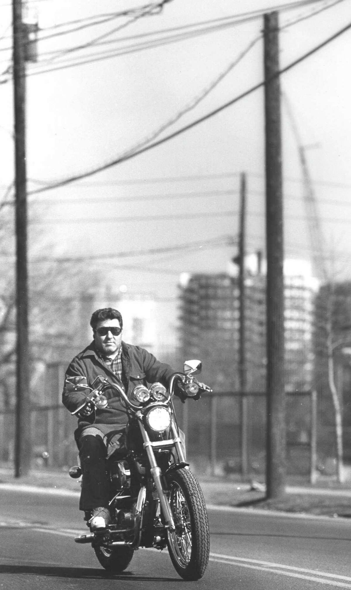 With temperatures in the high 40s, Nick Pisanelli takes his new Harley Davidson out for the first time on Feb. 18, 1988. But first, he had to push it to a cycle shop to get it started.